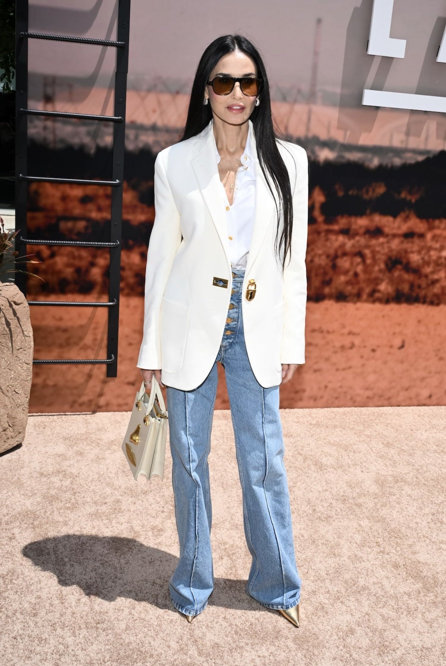 DEMI MOORE WEARS SCHIAPARELLI AT THE LANDMAN SCREENING