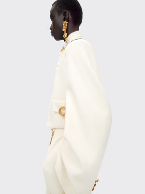 VESTE SANS COL À ÉPAULES CARRÉES