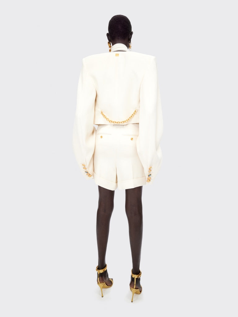 VESTE SANS COL À ÉPAULES CARRÉES