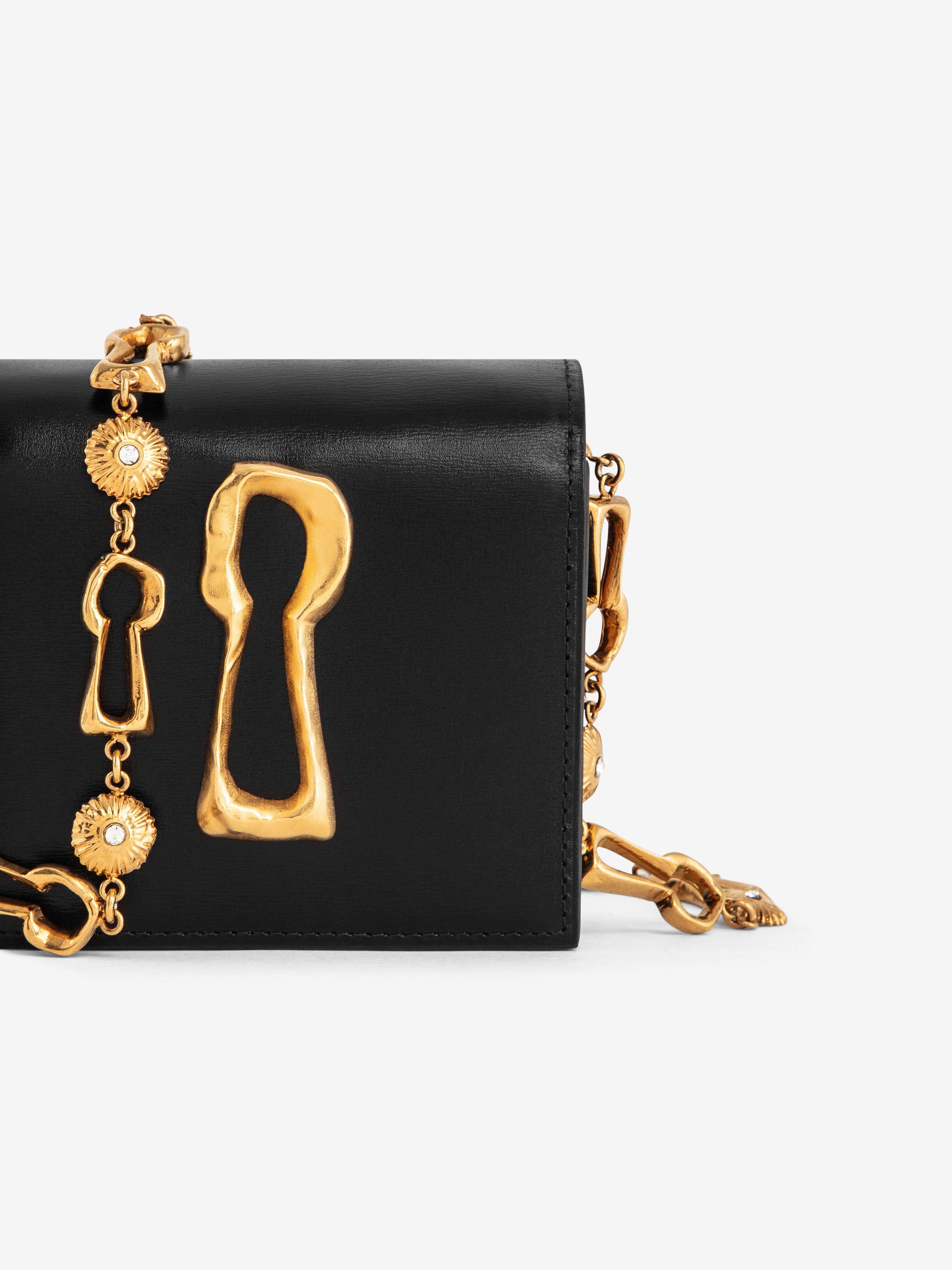 MINI LEATHER KEYHOLE CLUTCH