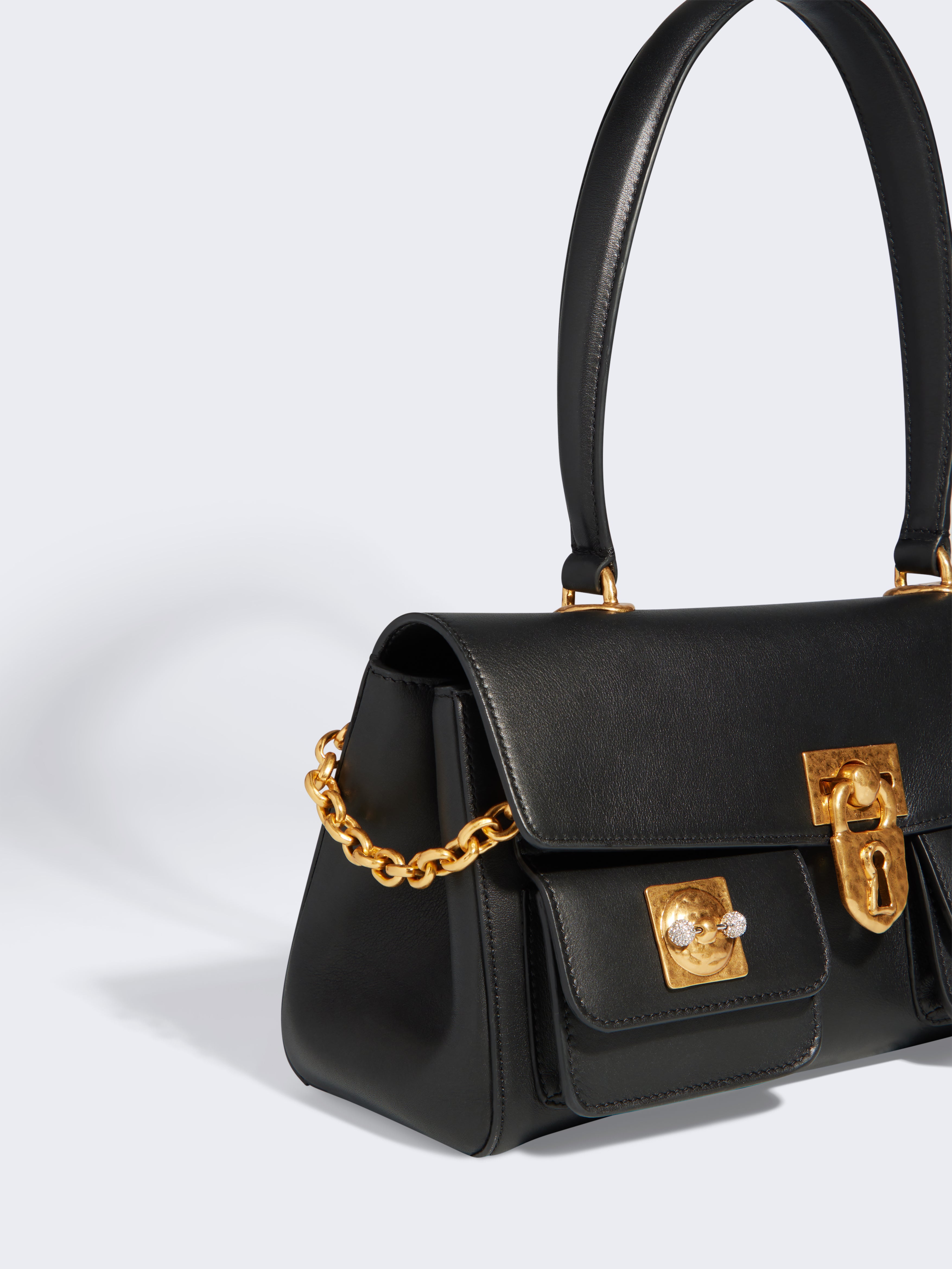 EAST-WEST MINI SECRET BAG