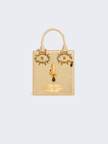 Golden anatomy jewelry bag